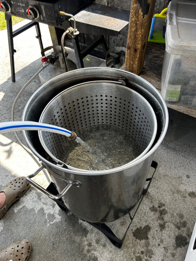Pot with strainer basket. Fill pot with water halfway to the top.