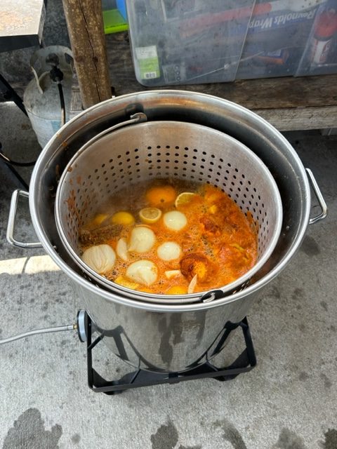 Load the pot with seasonings while the water is heating up.